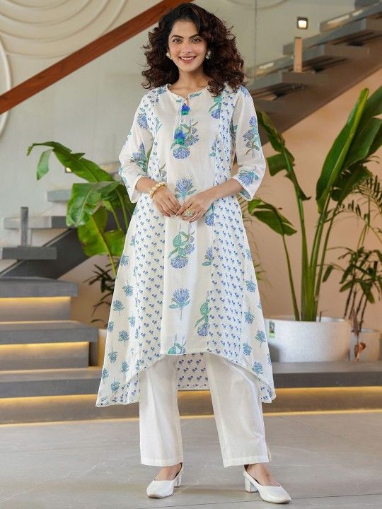High-low kurta set with a delicate blue floral print.
