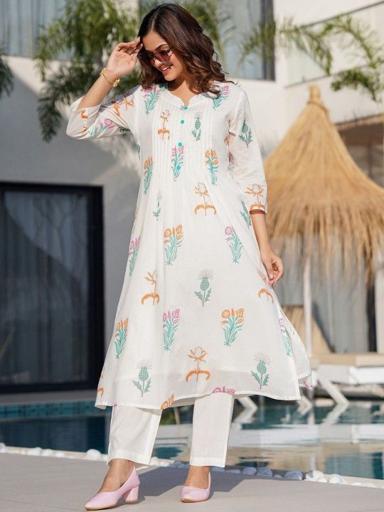 Mul cotton kurta set with a delicate floral print.