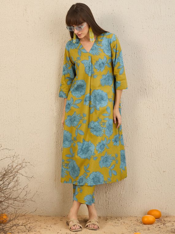 mustard yellow cotton kurta and pants set with blue floral print.